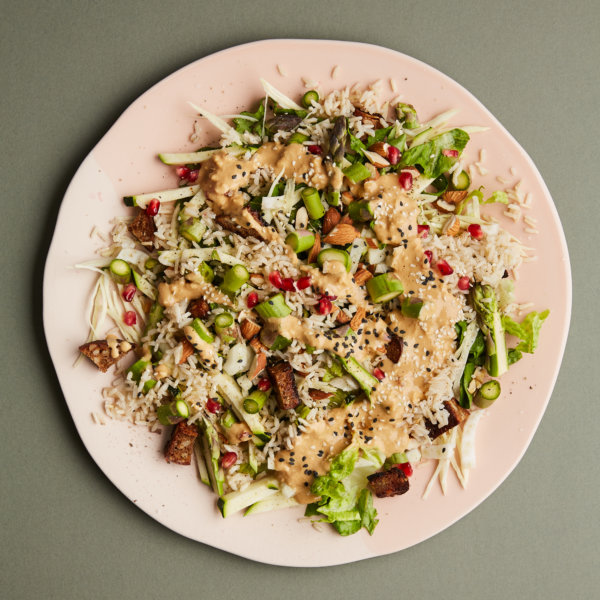 Asparagus and brown rice salad with almond, ginger and tamari dressing