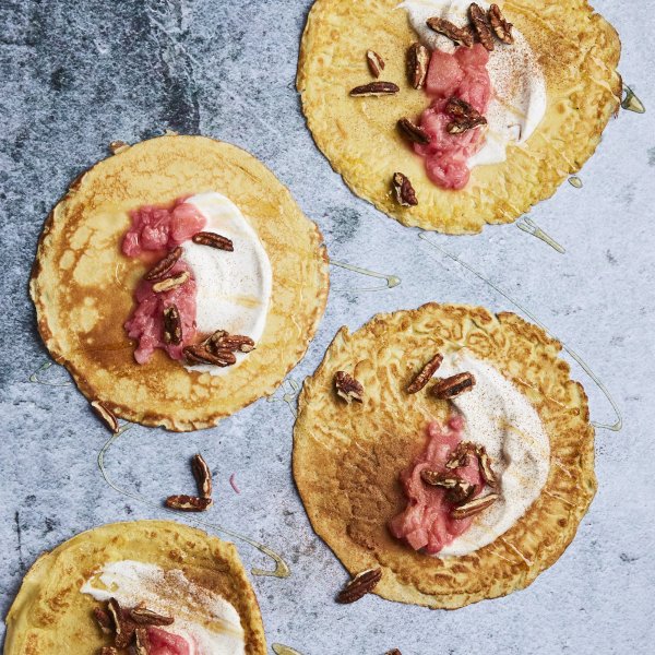 Crepes with coconut yoghurt, rhubarb and orange compote and toasted pecans