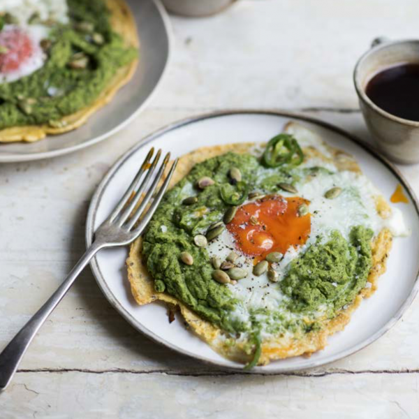 Flatbreads topped with spinach and egg